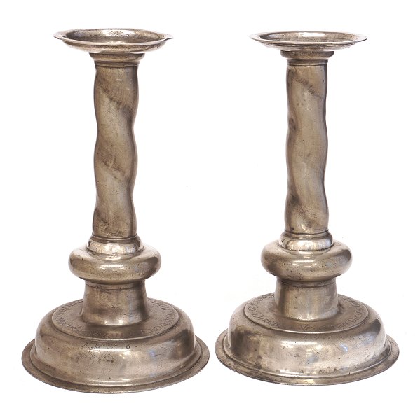 Pair of late 17th century pewter candelsticks dated 1678. "Johann Erdmann Maria 
Helenea Nevmann Pensionarivs". H: 33cm. D base: 19cm