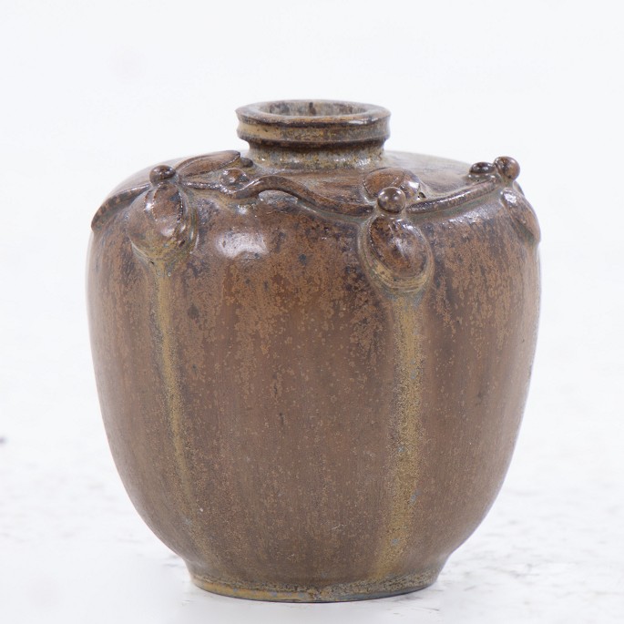 Arne Bang / Holmegaard stentøj
Stoneware vase glazed in brownish shades with floral decorations. Stamped by 
manufacturer.
1 pc. in stock
Good condition
