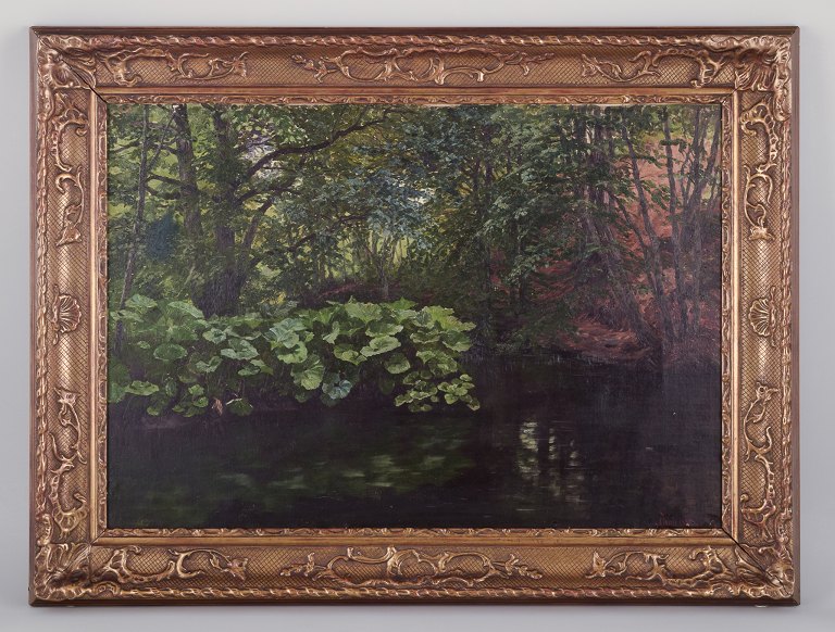 Carl Thiele (1860-1936), olie på lærred.
Motiv af dansk skovsø.