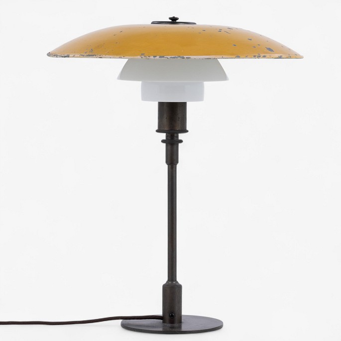 Poul Henningsen / Louis Poulsen
PH 4.5/3 - Table lamp in burnished brass with upper shade in yellow-lacquered 
zinc shade and middle and lower shade in white opal glass. Stamped 