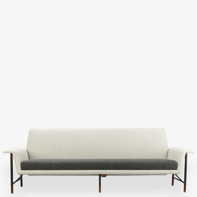 Finn Juhl / Niels Vodder.
Model FJ 56 - Rare four-seater sofa in textile with burnished steel frame and 
rosewood legs. Designed in 1956.
1 pc. in stock
