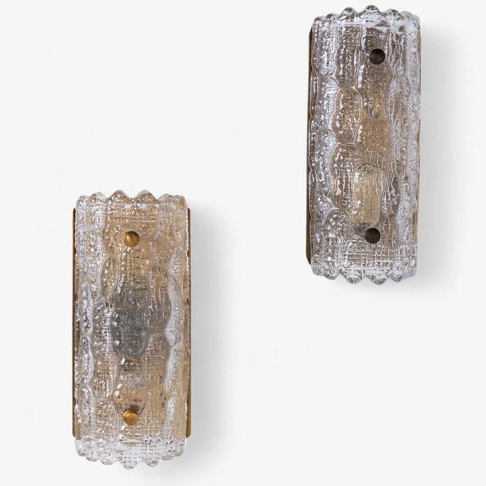 Carl Fagerlund / Orrefors
Pair of wall lamps in glass and brass.
1 pc. in stock
