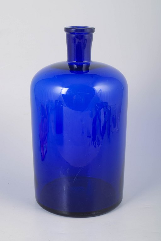 Scandinavian art glass bottle in blue glass.