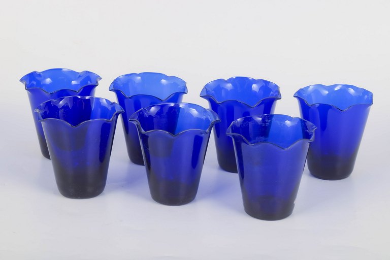 Set of seven Swedish cobalt blue drinking glasses.