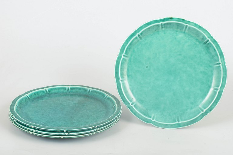 Wilhelm Kåge for Gustavsberg, sæt med fire Art Deco-tallerkener.
